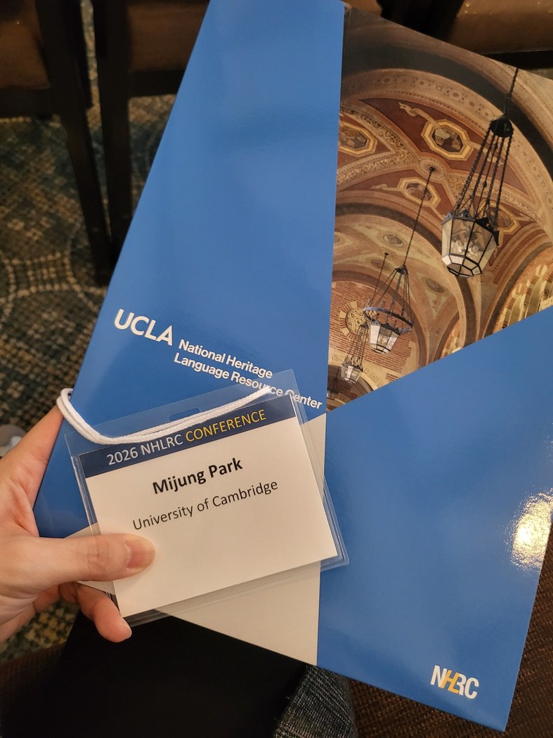 2026 UCLA National Heritage Language Resource Center conference materials and participant badge